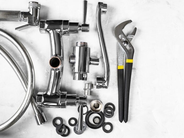 Close-up view of internal faucet parts needing repair
